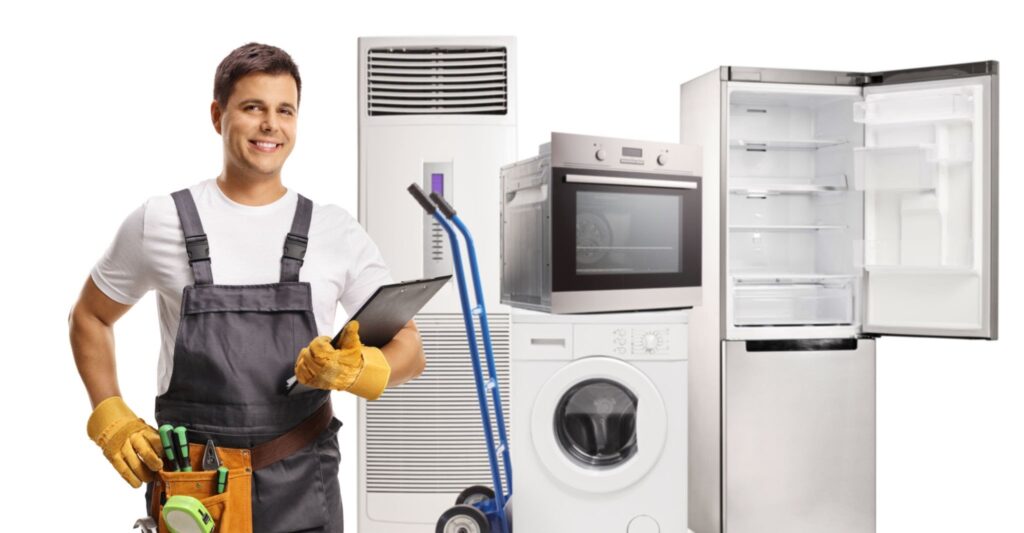 Handyman with domestic electrical appliances isolated on white background